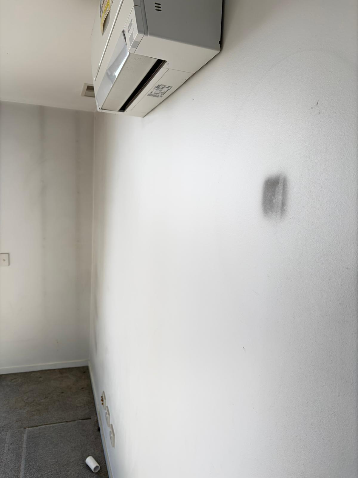 Dense Smokey scuff marks on the wall